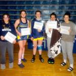 SUBMITTED PHOTO Aberdeen wrestlers (from left) Felicia Bell, Katie Gakin, Kya Roundtree, Hailey Wilson and Raegan Portmann led the Bobcats to a team title at the River Ridge Rumble on Saturday in Lacey.
