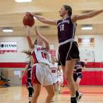 ALEC DIETZ | THE CHRONICLE Montesano forward Mikayla Stanfield blocks a shot from Teninos Grace Vestal during the Bulldogs 58-34 win on Saturday in Tenino.