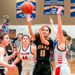 JARED WENZELBURGER | THE CHRONICLE North Beach junior Anna Eastman (11) looks to shoot during a 37-19 loss to Toledo in a 2B District 4 Tournament game Tuesday night in Rochester.