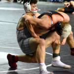 PHOTO BY SUE MICHALAK BUDSBERG Montesanos Mateo Sanchez, left, competes at the Mat Classic XXXII state-championship tournament on Friday at the Tacoma Dome.