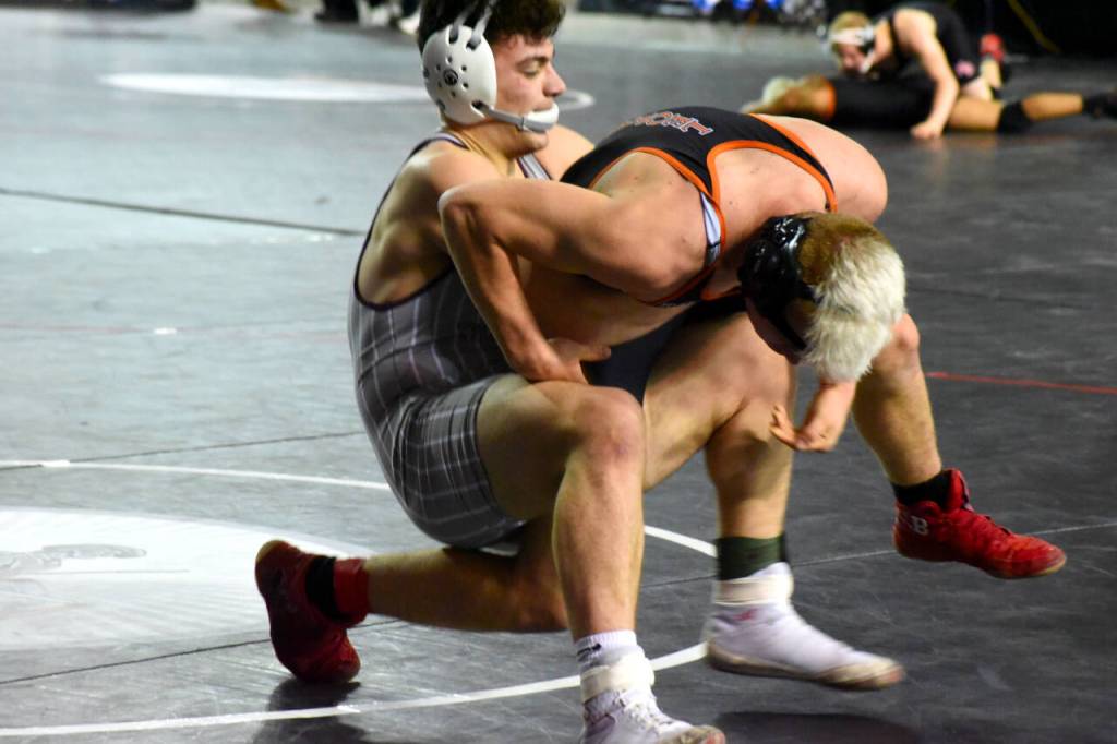 PHOTO BY SUE MICHALAK BUDSBERG Montesanos Mateo Sanchez, left, competes at the Mat Classic XXXII state-championship tournament on Friday at the Tacoma Dome.