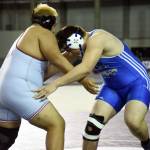 PHOTO BY SUE MICHALAK BUDSBERG Elmas Donovan Bishop, right, tangles with Toppenishs Rocco Clark III in the 1A 220 pound state-championship match on Saturday at the Mat Classic XXXIII meet in Tacoma.