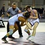 PHOTO BY SUE MICHALAK BUDSBERG Montesanos Cole Ekerson, right, grapples with Toppenishs Marcos Torrez in the 1A 132 pound state-championship match on Saturday at the Mat Classic XXXIII meet in Tacoma.