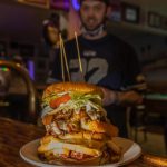 Porthole Pub Kitchen Manager Les Mong (pictured) encouraged owners Heidi and John Coffer to finally introduce the Burger Challenge. Photo courtesy of Stuart May