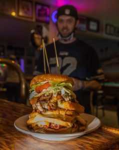 Porthole Pub Kitchen Manager Les Mong (pictured) encouraged owners Heidi and John Coffer to finally introduce the Burger Challenge. Photo courtesy of Stuart May