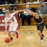 RYAN SPARKS | THE DAILY WORLD Willapa Valley guard Riley Pearson (10) is defended by Sunnyside Christians Jaden Jech during the Vikings 65-59 victory in a 1B Regional round game on Saturday at WF West High School in Chehalis.