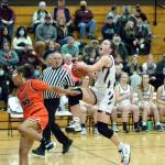 RYAN SPARKS | THE DAILY WORLD Montesano guard Jaiden King, right, is fouled by Zillahs Talani Oliver while driving to the basket during Montesanos 59-52 win over Zillah in a 1A Regional game on Saturday at WF West High School in Chehalis.
