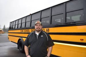 Matthew N. Wells | The Daily World 
Caleb Bogar, Elma School Districts transportation director, shows The Daily World the districts new, electric Saf-T-Liner C2 Jouley Thomas Built bus. The bus holds up to 81 passengers, has enhanced braking, sends out zero emission and needs no fuel station fill-ups.