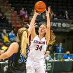 ERIC TRENT | THE CHRONICLE Raymond sophomore Paige Williams (34) puts up a shot against La Conners Ellie Marble during the Seagulls 67-52 loss in the WIAA 2B State Tournament fourth/sixth-place game on Saturday at the Spokane Arena.