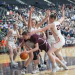 RYAN SPARKS | THE DAILY WORLD Montesano junior McKynnlie Dalan, center, is surrounded by a trio of Cashmere defenders during the Bulldogs 41-33 loss in the 1A State third/fifth-place game on Saturday in Yakima.