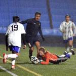 RYAN SPARKS | THE DAILY WORLD Elma goal keeper Andy Salvatierra dives to grab a loose ball in front of Aberdeen forward Daniel Guzman (23) in a 1-1 draw on Saturday in Aberdeen.