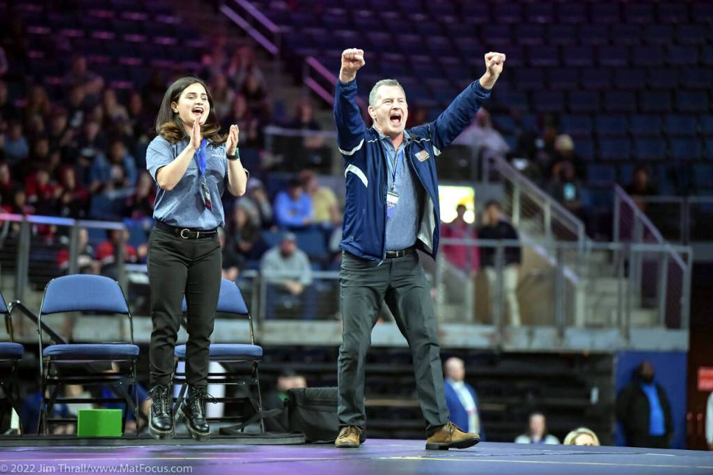 JIM THRALL | MATFOCUS.COM Grays Harbor College wrestling assistant coach Kateri Rowell, left, and head coach Kevin Pine cheer after the Chokers Tatum Pine won an NCWA National Championship on Saturday in Allen, Texas.