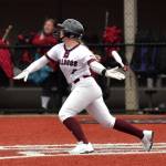 RYAN SPARKS | THE DAILY WORLD Montesanos Ali Parkin smashes a two-run home run in the first inning of a 7-4 loss to Hoquiam on Friday at Dick Tagman Field in Montesano.