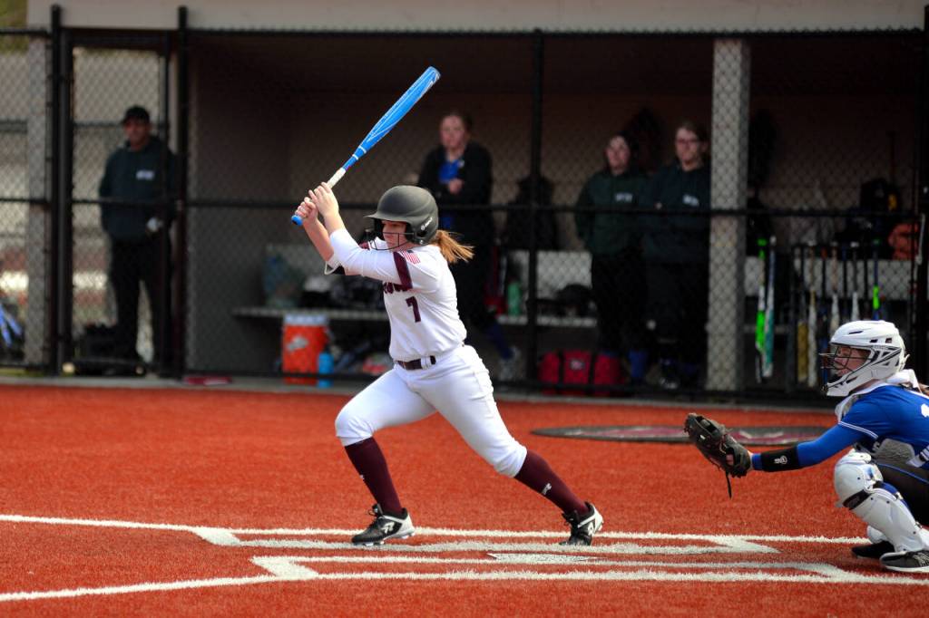 RYAN SPARKS | THE DAILY WORLD Montesanos Reghann Fairbairn smacks a base hit during the Bulldogs 9-8 win over Lakeside (Nine Mile) on Tuesday at Montesano High School.