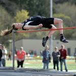 RYAN SPARKS | THE DAILY WORLD Raymond senior Kyra Gardner clears the bar in the high jump event at the Henrie-Weisel Tri-District Meet on Thursday at South Bend High School. Gardner cleared five feet, eight inches to win the event, tying her season-best and the states second-best mark in the process.
