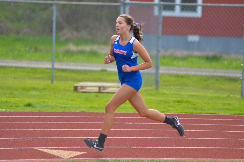 RYAN SPARKS | THE DAILY WORLD Willapa Valley senior Brooklyn Strozyk rounds the final turn in the girls 1600-meter race at the Henrie-Weisel Tri-District Meet on Thursday at South Bend High School. Strozyk won the event with a season-best time of 6:25.24.