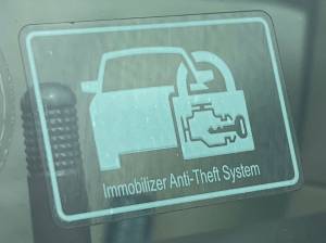 In order to help keep criminals from targeting their vehicle, Grays Harbor County Undersheriff Brad Johansson recommends having visible devices, such as the use of steering wheel locks, theft-deterrent decals  such as the one pictured, flashing lights, and window etching. (Matthew N. Wells | The Daily World)