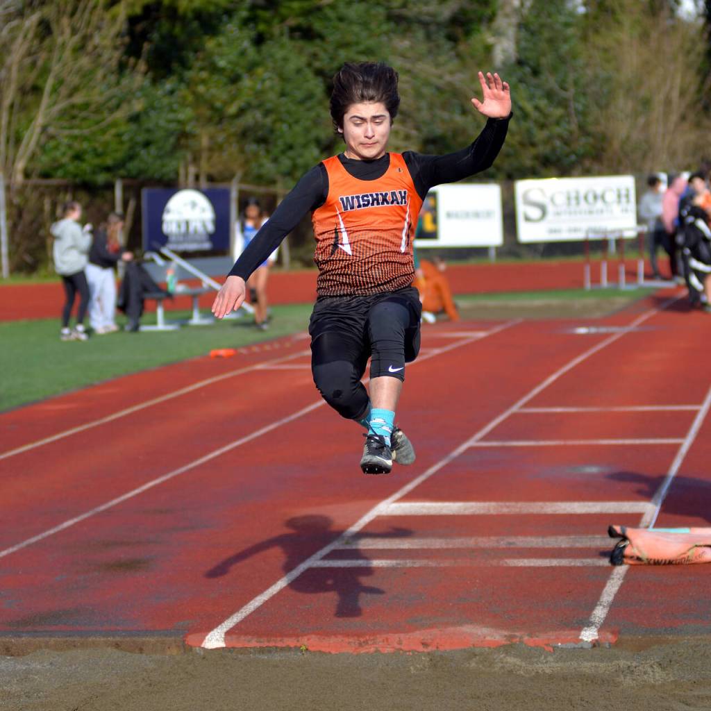 RYAN SPARKS | THE DAILY WORLD Wishkah Valleys Rique Guzman-Gadwa leaps 17 feet, five inches to tied for third in the boys long jump event at the Ray Ryan Memorial Grays Harbor Championships on Friday in Montesano.