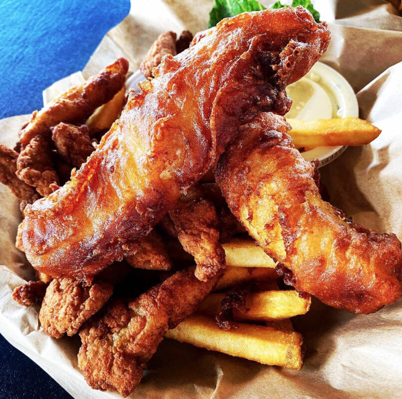 Bennetts mouthwatering cod, clams strips, and fries basket.