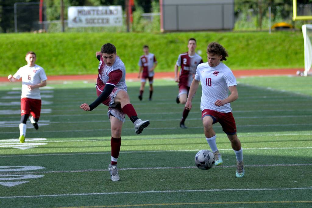 RYAN SPARKS | THE DAILY WORLD Montesano freshman Felix Romero takes a shot while Hoquiams Code Drake defends during the Bulldogs 3-0 win on Monday in Montesano.