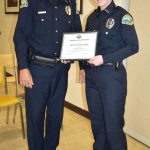 Matthew N. Wells | The Daily World 
Aberdeen Police Department Chief Steve Shumate bestows the departments Lifesaving Award to fellow APD Officer Brandi Slater after he relayed the story about the call that showed Slaters mettle. Slater, whos been with APD for five years, called her save on Thursday morning, Jan. 13, 2022, a scary moment.