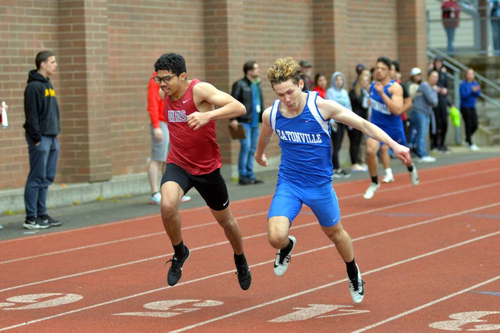 RYAN SPARKS | THE DAILY WORLD Hoquiams Gio Foster, left, and Eatonvilles John Kralick both finished with a personal-best time of 23.14 in the boys 200-meter race during the 1A Evergreen Sub-District Championships on Friday in Montesano. Kralik was deemed the winner via photo finish.