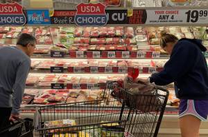 Consumers shop for meat at a Safeway grocery store in Annapolis, Md., on May 16, 2022, as Americans brace for summer sticker shock as inflation continues to grow. (JIM WATSON | AFP VIA GETTY IMAGES | TNS