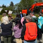 Allen Leister | The Daily World 
Audience members gather to listen to Grays Harbor College Board President Ed Brewster, as he explains details of the Student Services & Instruction Building project. The project is set to be completed in fall 2023.