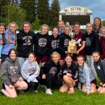 SUBMITTED PHOTO The Montesano girls track and field team pose with the 1A District 4 championship trophy after winning the district-championship meet on Thursday at Seton Catholic High School in Vancouver.