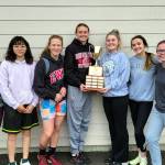 SUBMITTED PHOTO The Raymond girls track and field team won its first district title in school history at the 2B District 1/4 Championships on Friday at WF West High School in Chehalis. Pictured (from left) are state qualifiers Elizabeth Meade, Lisa Finne, Karsyn Freeman, Kyra Gardner, Kendall Thompson, Jolie Dunn and Genevieve Sarich.