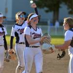 RYAN SPARKS | THE DAILY WORLD Pe Ell-Willapa Valley left fielder Grace Huber, second from right, is congratulated by her teammates after making a diving catch to end the top of the sixth inning in an 11-1 win over the Onalaska Loggers in the 2B District 4 semifinals on Friday in Centralia.