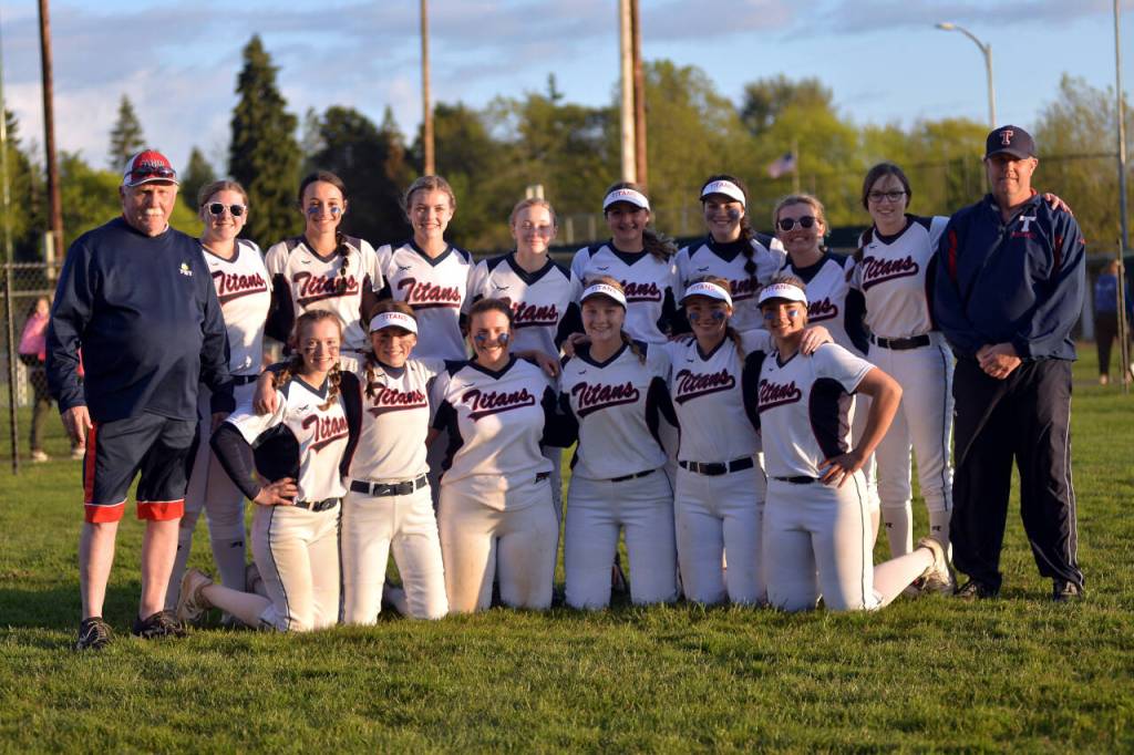 RYAN SPARKS | THE DAILY WORLD The Pe Ell-Willapa Valley Titans were all smiles after securing a trip to the state tournament and berth in the 2B District 4 championship game with an 11-1 win over the Onalaska Loggers on Friday in Centralia.