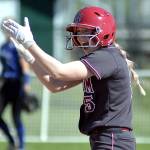 RYAN SPARKS | THE DAILY WORLD Hoquiam second baseman Ella Folkers cheers on her teammates after belting a bases-clearing three-run double to give the Grizzlies a 3-2 lead in the second inning of the 1A District 4 championship game on Saturday in Centralia.
