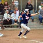 RYAN SPARKS | THE DAILY WORLD Pe Ell-Willapa Valleys Lauren Matlock triples during the Titans 14-13 loss in the 2B District 4 Tournament championship game on Saturday at Fort Borst Park in Centralia.