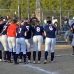 RYAN SPARKS | THE DAILY WORLD Pe Ell-Willapa Valleys Dani Shannon, right, heads home after hitting a home run during the Titans 14-13 loss in the 2B District 4 Tournament championship game on Saturday at Fort Borst Park in Centralia.