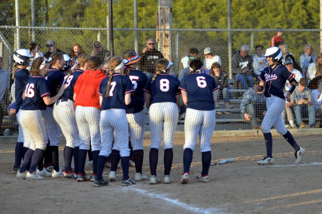 RYAN SPARKS | THE DAILY WORLD Pe Ell-Willapa Valleys Dani Shannon, right, heads home after hitting a home run during the Titans 14-13 loss in the 2B District 4 Tournament championship game on Saturday at Fort Borst Park in Centralia.