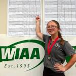 SUBMITTED PHOTO Montesano sophomore Hailey Blancas points to her score after placing second at the 1A State Girls Golf Tournament on Wednesday at Indian Canyon Golf Course in Spokane.