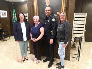Matthew N. Wells | The Daily World
Aberdeen Police Department Chief Steve Shumate stands, from left, with his wife Mandy, his mother Charlotte, and his sister Cindy Stutesman. Shumate, retiring June 30, 2022, after 33 years of service combined in Grays Harbor County, is ready for a break. His family is excited to have him back home. Mandy cant wait for him to fulfill his promise to her, which is to cook for her every night.