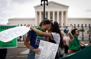 Activists react to the Dobbs v Jackson Womens Health Organization ruling which overturns the landmark abortion Roe v. Wade case in front of the U.S. Supreme Court on June 24, 2022, in Washington, D.C. Anna Moneymaker | Getty Images | TNS