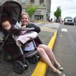 Matthew N. Wells | The Daily World
Hana and her 11-month-old daughter Hazel Lichty await the festivities of the Aberdeen Founders Day Parade on Saturday, July 2, 2022, near South Broadway Street and East Market Street.