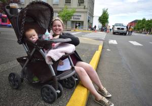 Matthew N. Wells | The Daily World
Hana and her 11-month-old daughter Hazel Lichty await the festivities of the Aberdeen Founders Day Parade on Saturday, July 2, 2022, near South Broadway Street and East Market Street.