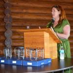 Lynnette Buffington, CEO for Greater Grays Harbor, Inc. talks about how the recruitment and retention issues that face local  police and fire departments also extend into the private sector during the business forum luncheon on Tuesday, July 26, at Rotary Log Pavilion. (Matthew N. Wells | The Daily World)