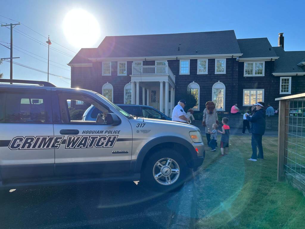 Hoquiam Police Crime Watch, which now retired Hoquiam Police Department Chief Jeff Myers started in 2012, sits parked in front of the Polson Museum, where more than 40 people gathered for National Night Out on Tuesday, Aug. 2, 2022, to talk to each other, have some delicious food, and interact with Hoquiam police officers and Hoquiam firefighters. (Matthew N. Wells | The Daily World)
