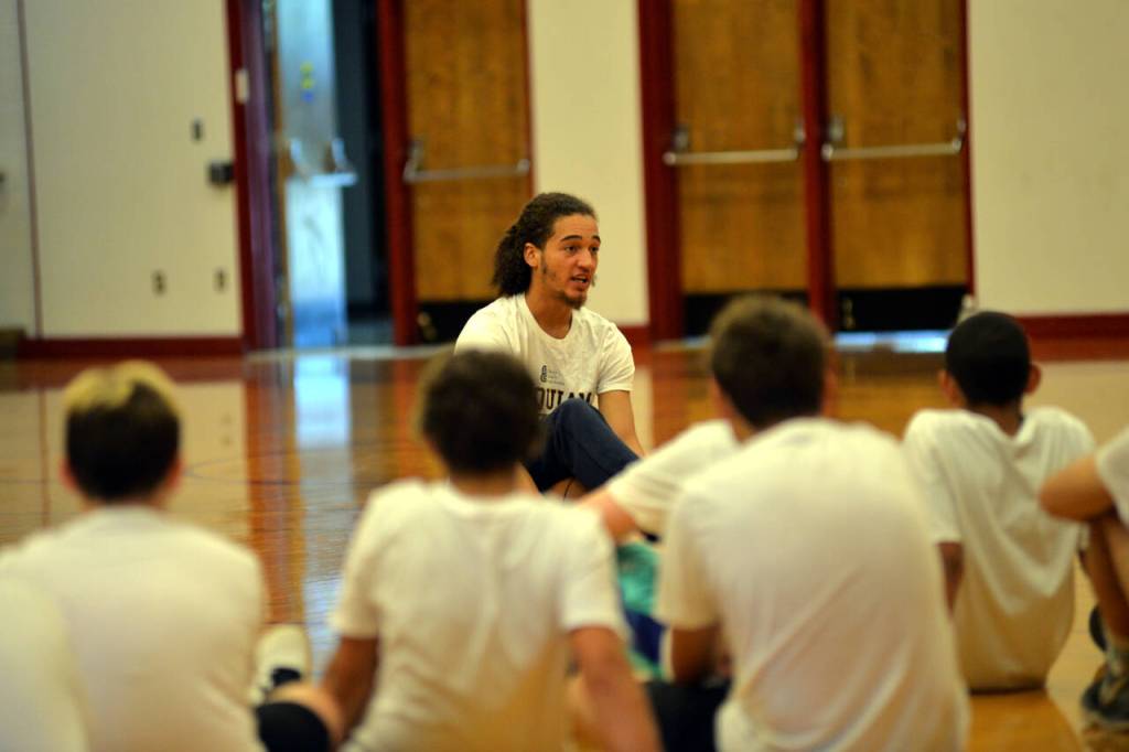 RYAN SPARKS | THE DAILY WORLD The Minnesota Timberwolves CJ Elleby takes questions from camp participants at the Hoquiam Youth Basketball Camp on Thursday, Aug. 4, 2022 at Hoquiam High School.