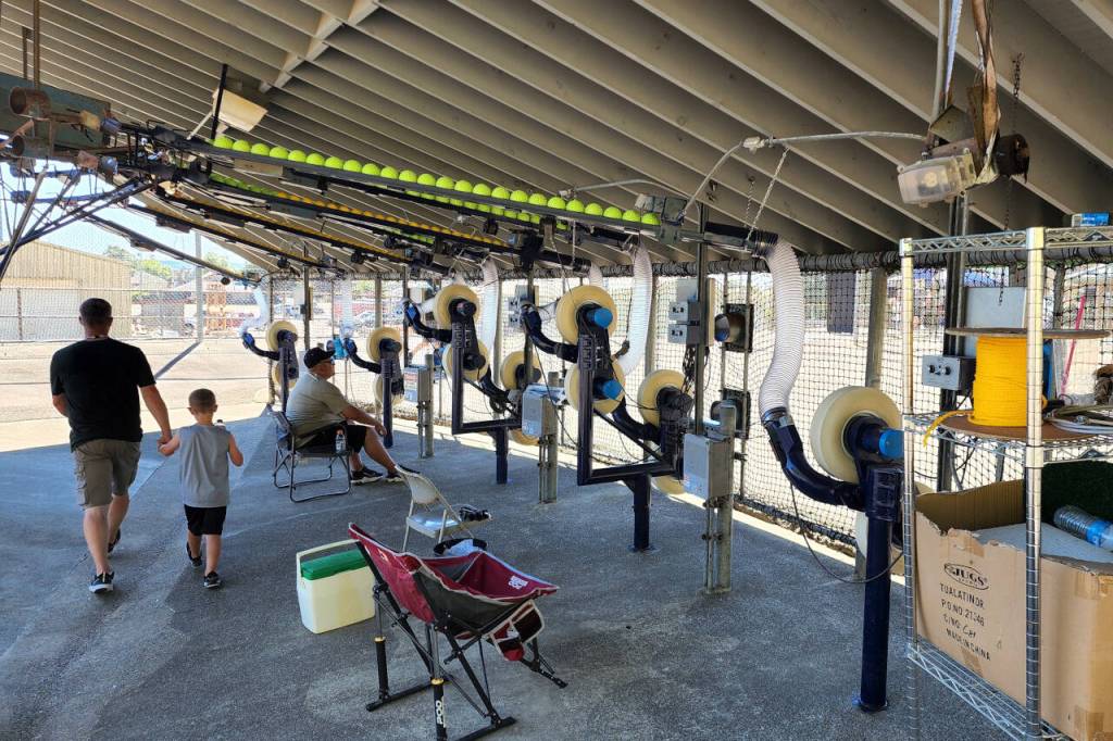 RYAN SPARKS | THE DAILY WORLD The pitching machines at Mr. Ts Bat-O-Rama had been refurbished and were running at full capacity for Sundays grand re-opening of the facility, which had been closed for eight years.