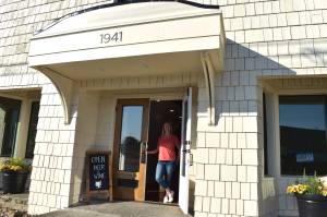 Matthew N. Wells | The Daily World 
On Wednesday, Aug. 17, 2022, Nancy Dudley stands in the doorway to her new business, Red Cedar at the Vasa  1941 Riverside Ave., in Hoquiam  and like the open sign says, its a place for everybody. Everybody means four-legged friends are welcome, too. Everyone is welcome, Dudley said.