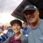 SUBMITTED PHOTO Kesten Delia, left, watches a Little League World Series game with his grandfather, John, in late August in Williamsport, Penn.