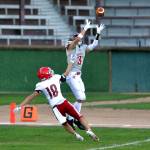 RYAN SPARKS | THE DAILY WORLD Hoquiam wide receiver Owen McNeill (3) catches a touchdown pass over Fort Vancouver defensive back Brayden Vilendre during the Grizzlies 49-28 victory on Thursday in Hoquiam.