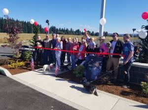 Photos by Allen Leister | The Daily World
After nearly a year of construction, the Martin Family Dog Park hosted its grand opening on Saturday, Sept. 24, in Elma. The project was dedicated to Joan Martin (holding scissors) and her husband Bill.
