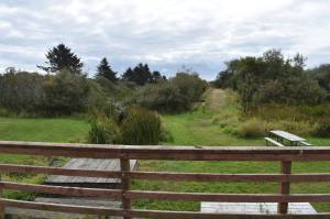 The North End Grand Canal Park features a grass walking trail, picnic tables and benches near the northernmost tip of the Grand Canal. (Clayton Franke | The Daily World)